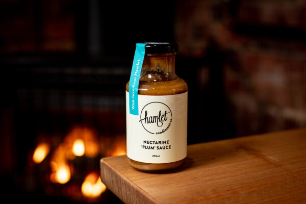 A 250ml bottle of Hamlet Condiment Co's Nectarine Plum Sauce.